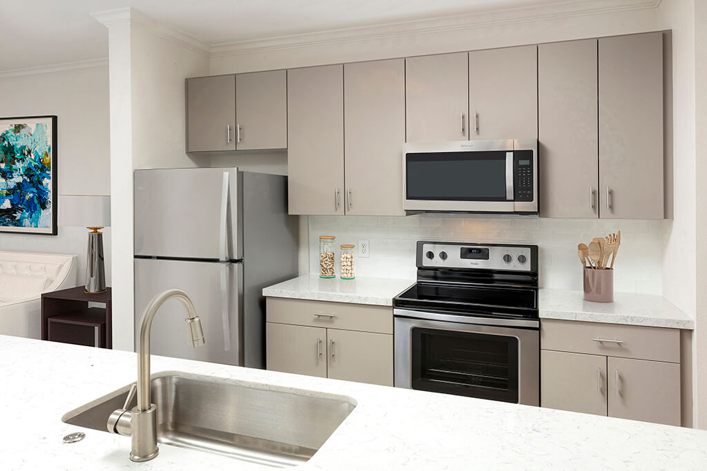 Kitchen with appliances at Landara Apartments in Ontario CA